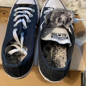 Slightly worn black converse.  Only worn a few times